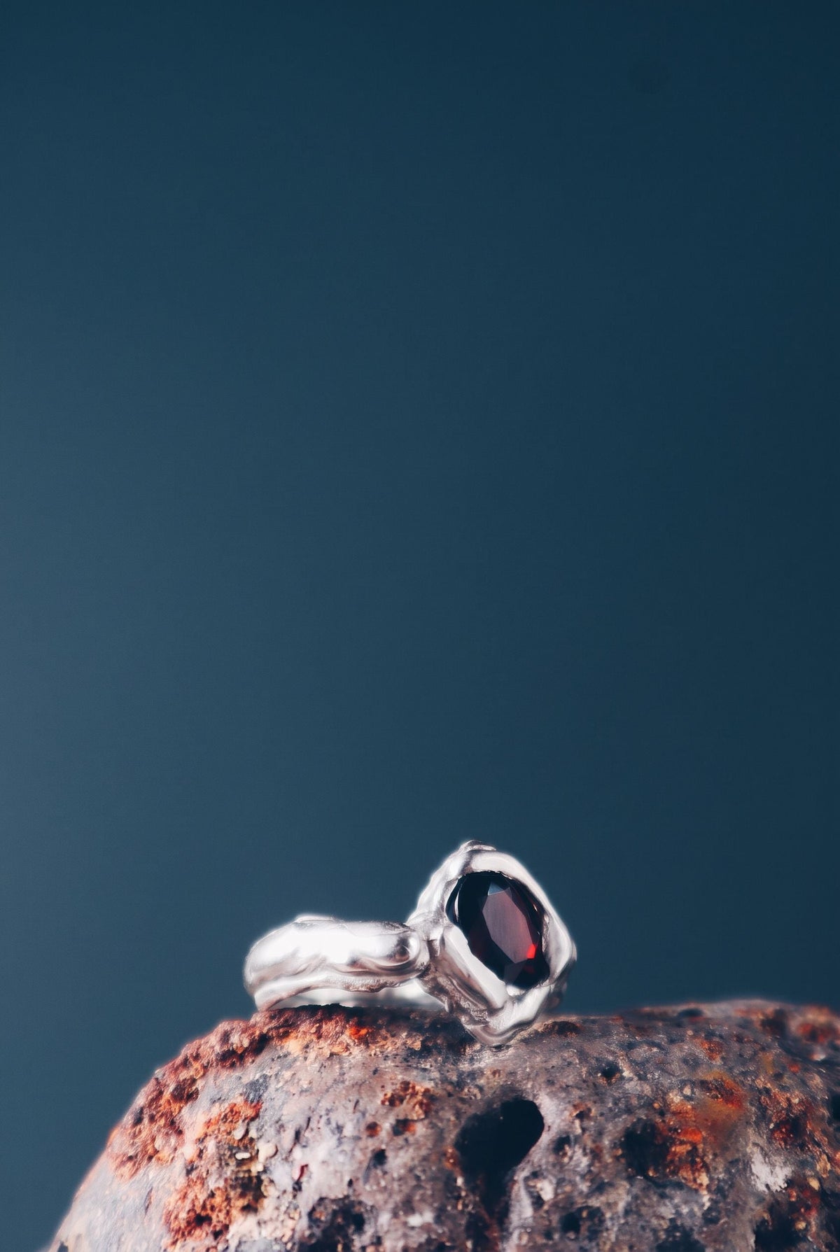 Kerid Crater In Gold, white gold version with garnet, by Bocavolcan