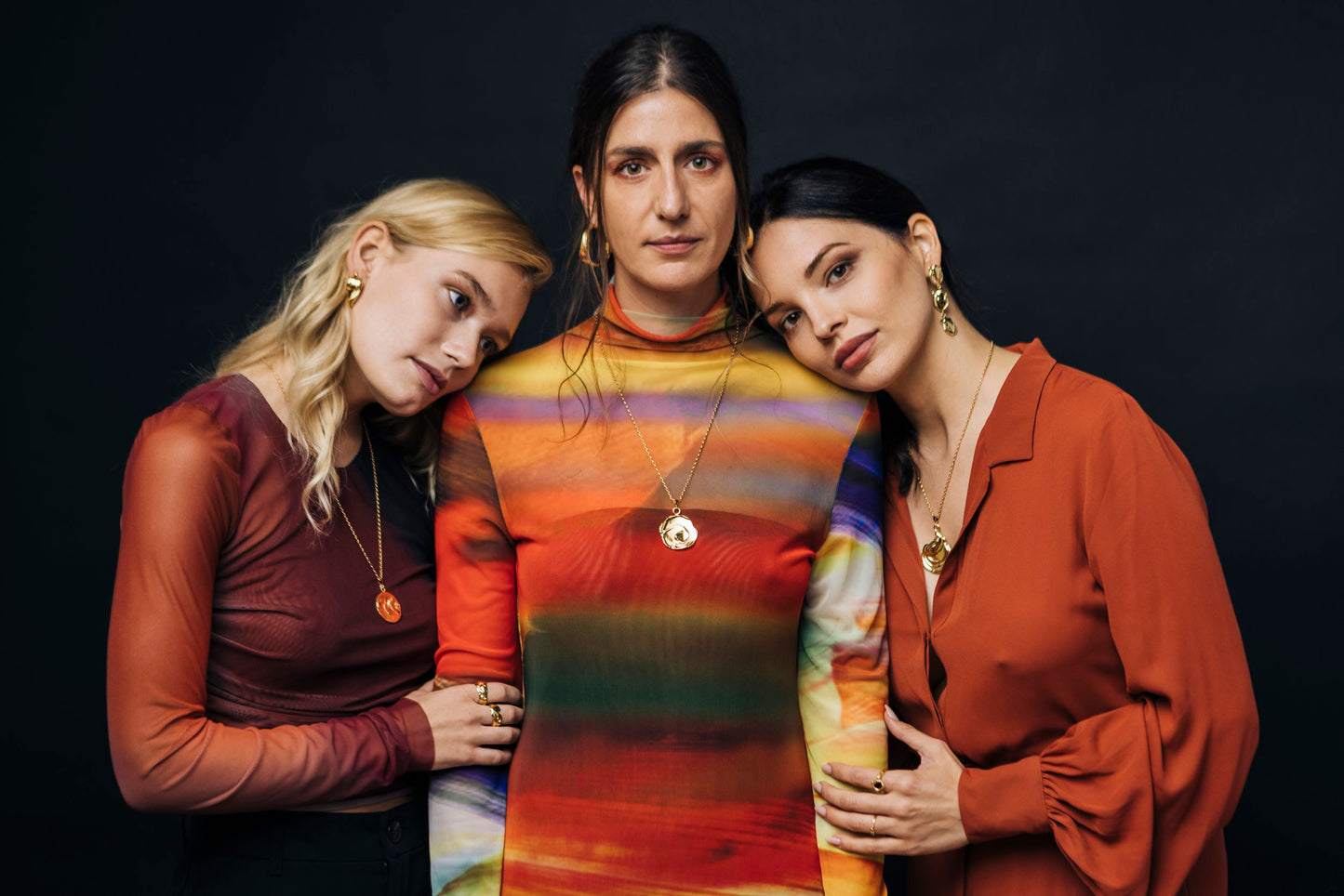 Gold Plated 925 Silver "Lahar", "Lago" and "Mar" necklaces handcrafted in Valencia worn by three models