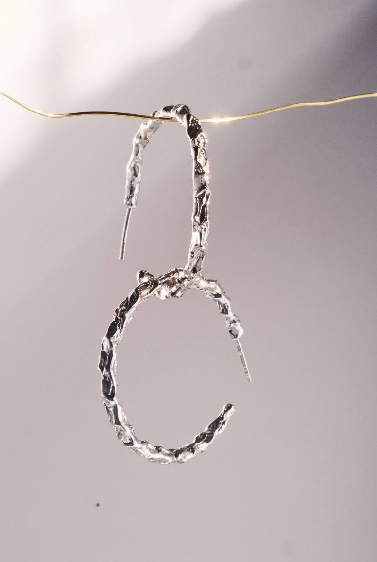 Venus Origen Hoops, silver version, hoop earrings by Bocavolcan